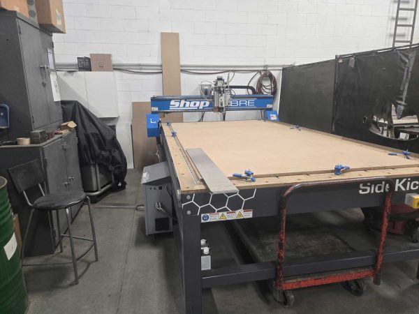 This is a picture of a CNC Shop Sabre used to cut sheetmetal and other materials for the OxyTech Job Shop.